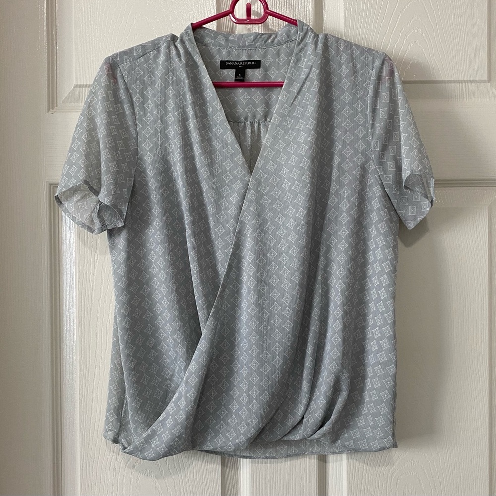 Banana Republic gray patterned wrap front blouse.